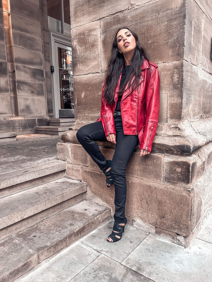 Red real leather jacket worn over black