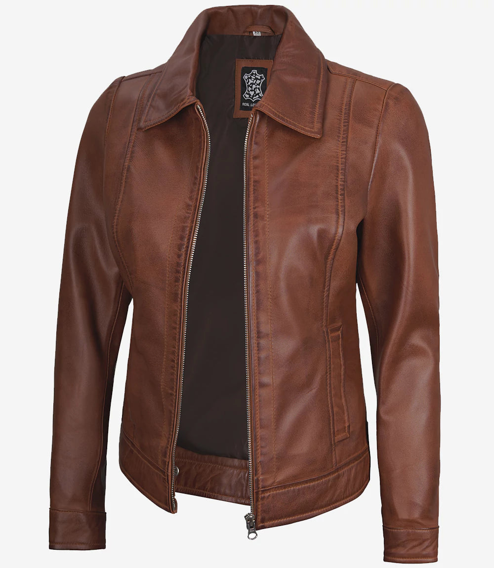 A cognac brown wax women's Harrington leather jacket with a classic shirt collar, zip closure, snap adjustments at the waist and cuffs, and two side pockets.